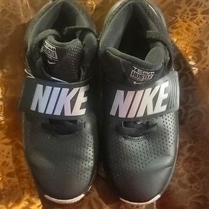 Boys Nike Sneakers size 5, black/sliver  in color.